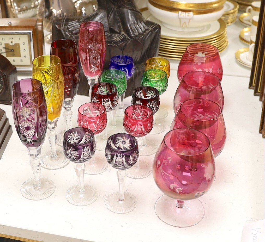 A group of mixed coloured bowl wine glasses